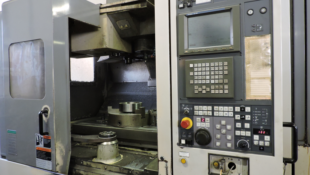 MORI SEIKI SV-50 - Centro di lavoro verticale con due pallet