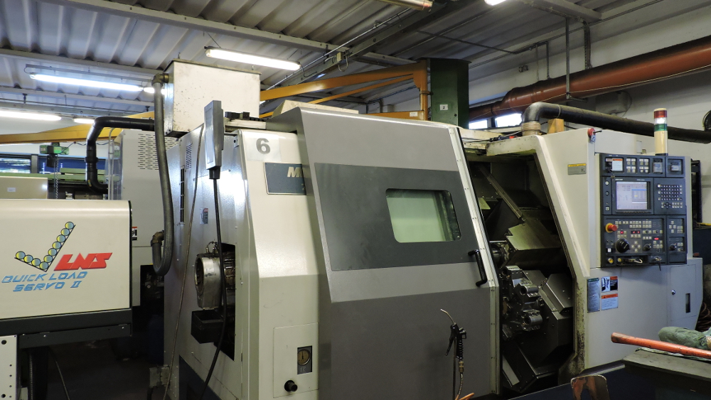 MORI SEIKI ZL-250M - Tornio CNC a quattro assi con due torrette motor. e caricat. autom.